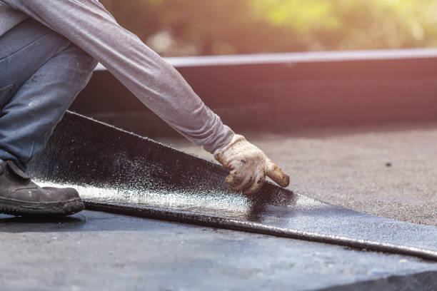 Professional Basement Waterproofing technician working in La Follette, TN
